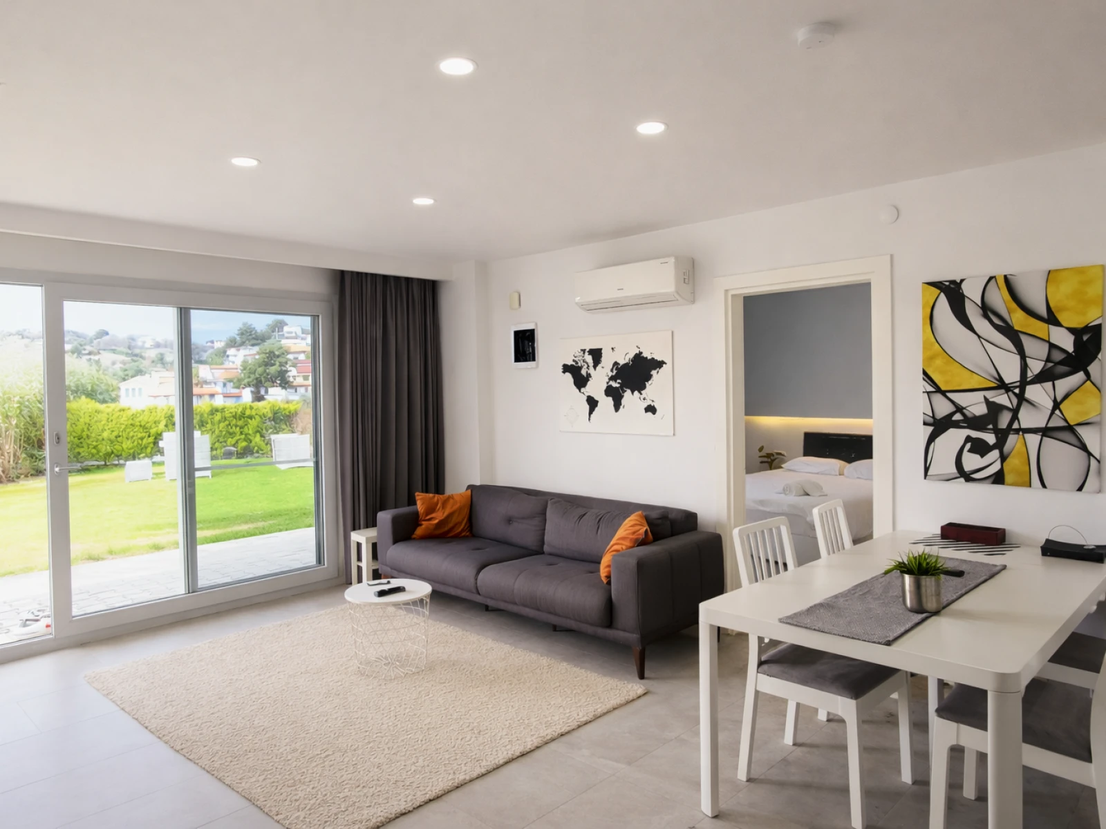 Kuşadası Lavender Residence B2 living room, dining area, and living space opening to the garden