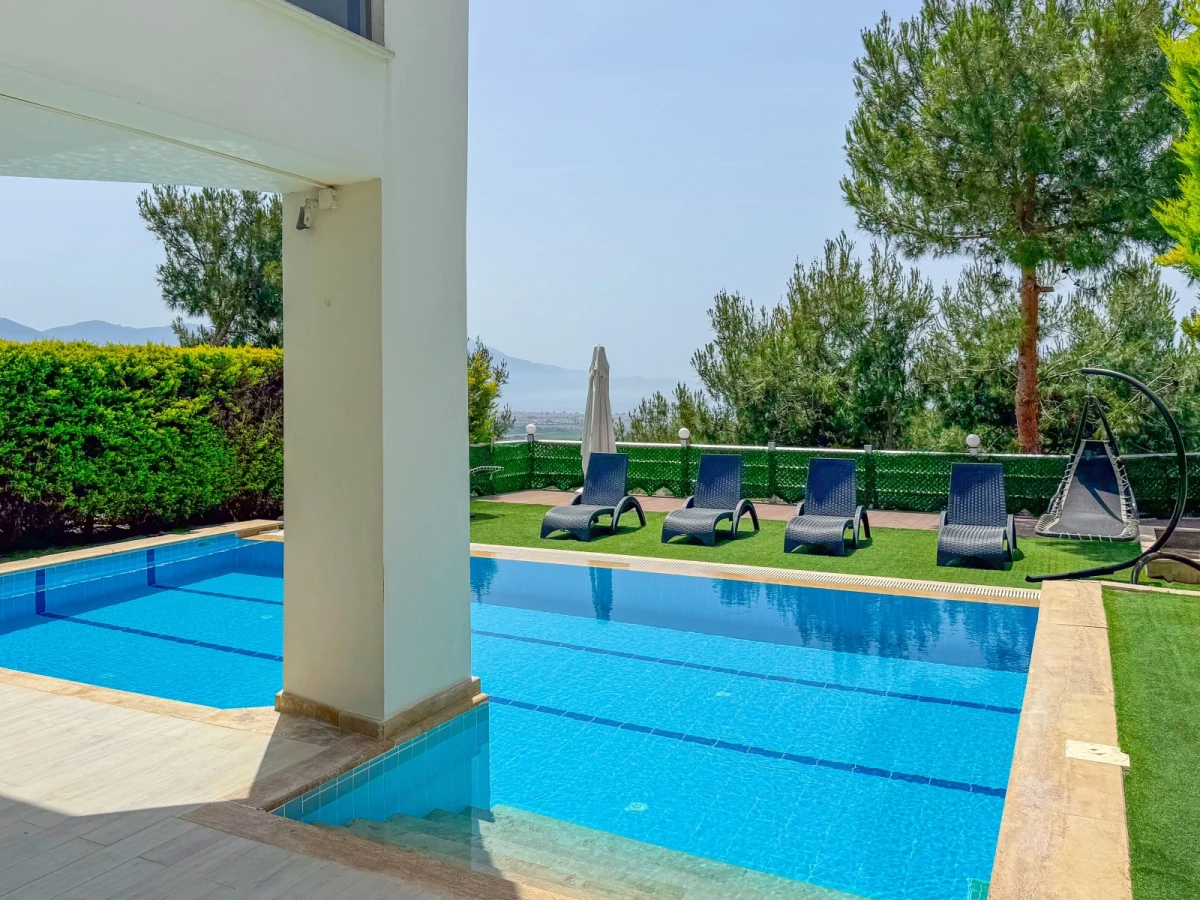 Modern villa exterior with private pool and garden view