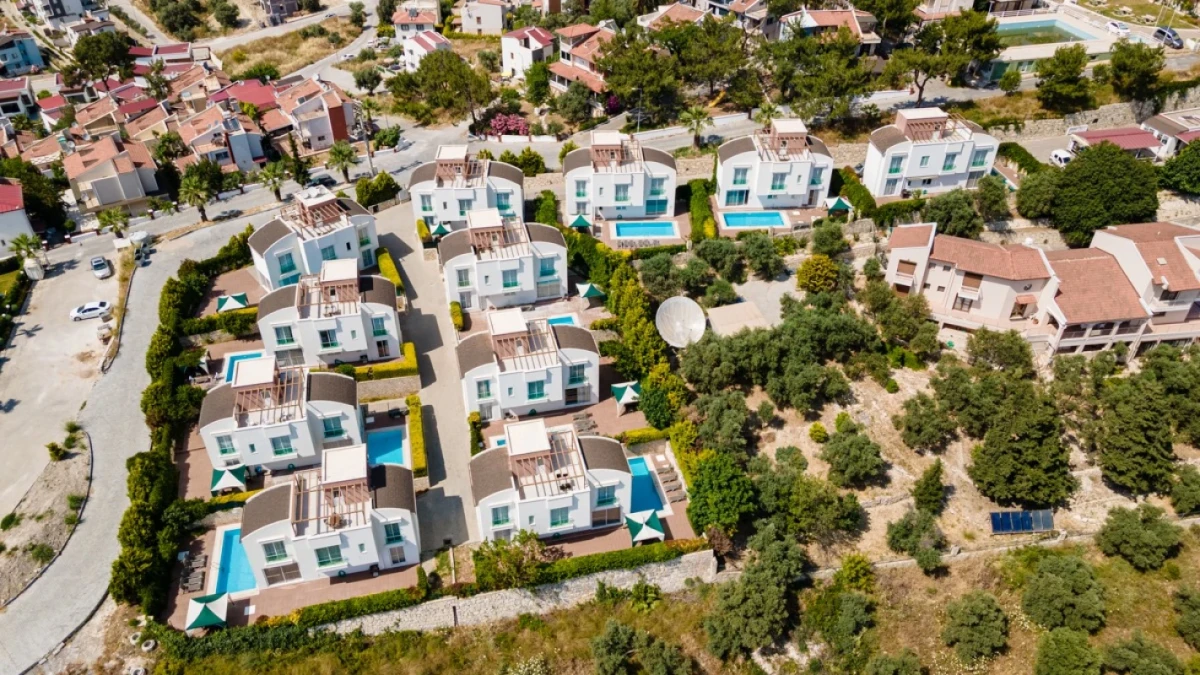 Aerial view of villa complex and site layout