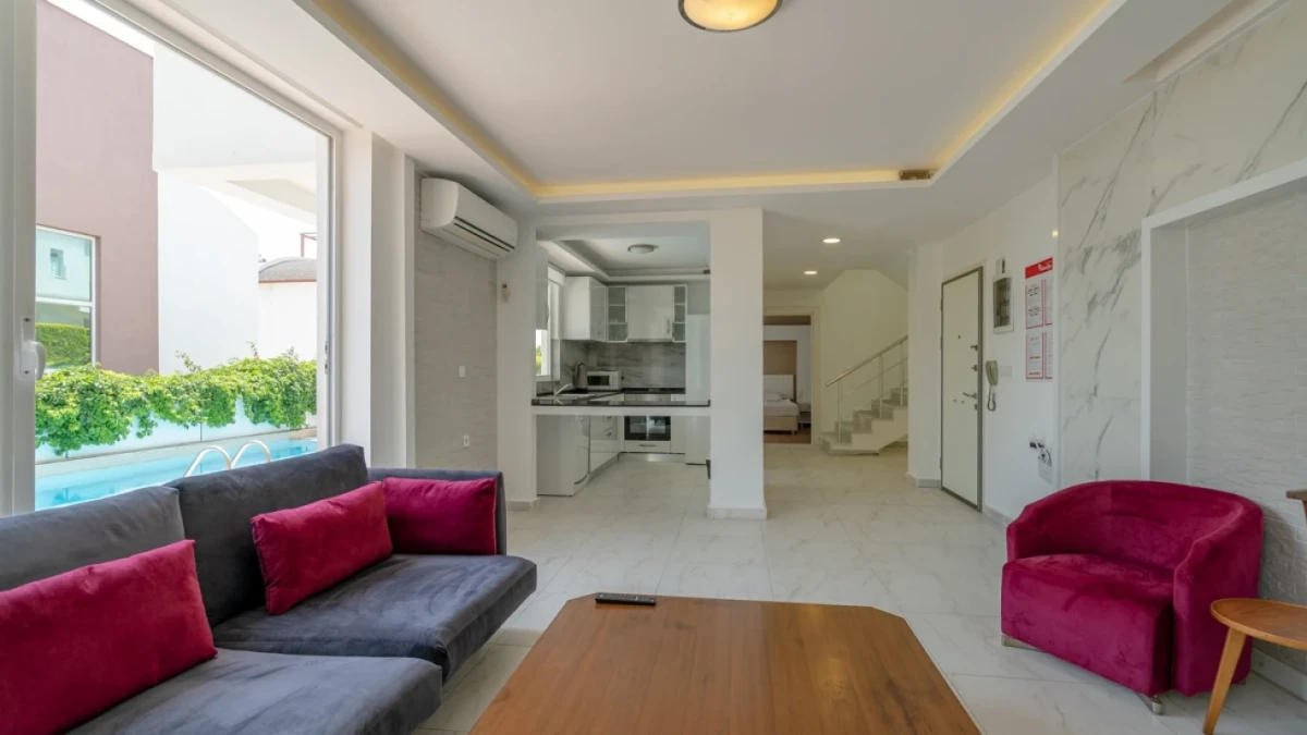 Modern living room with open kitchen