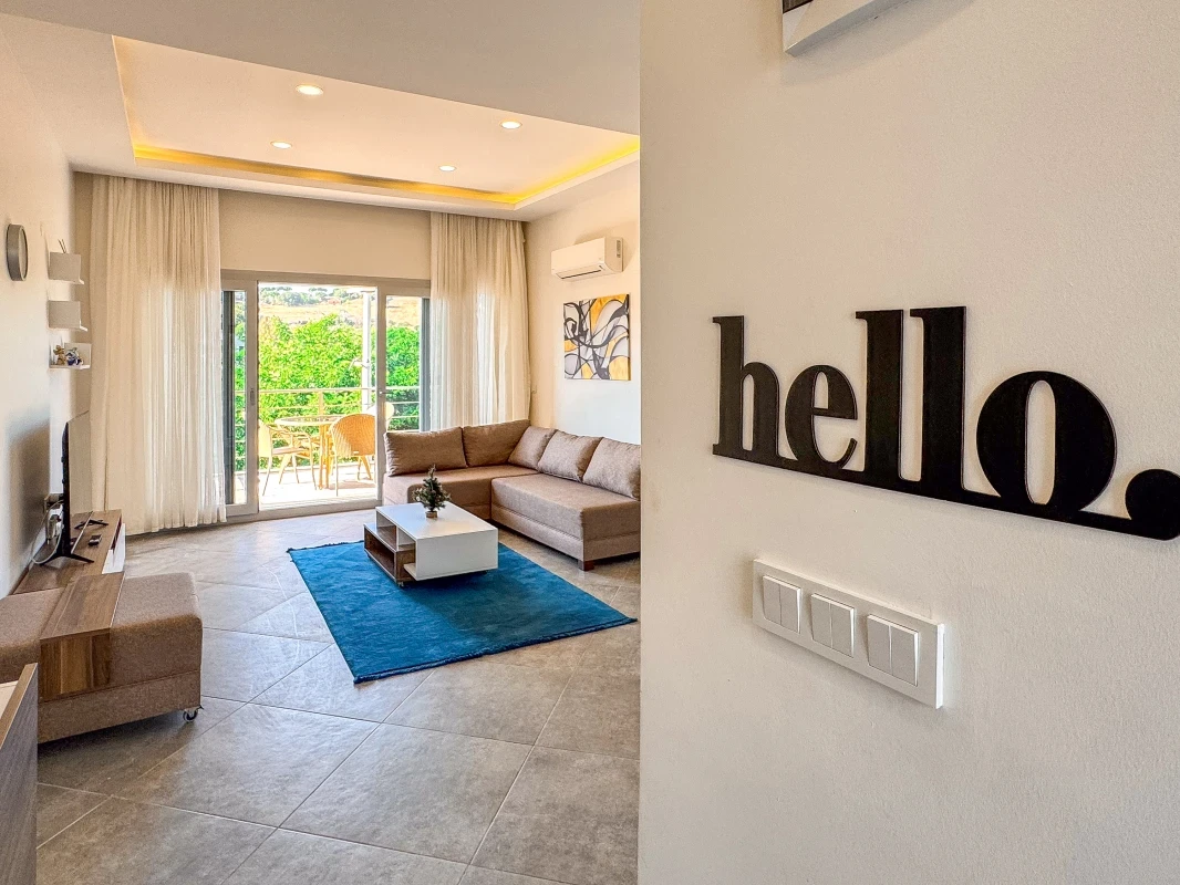 Kuşadası Lavender Residence A5 entrance view to the living room and bright living area