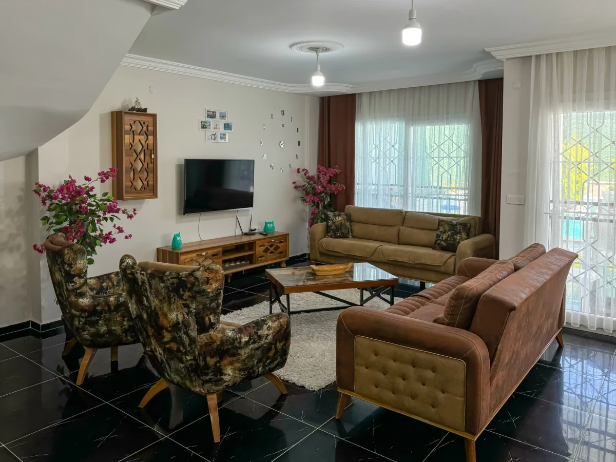 Living room seating area with TV