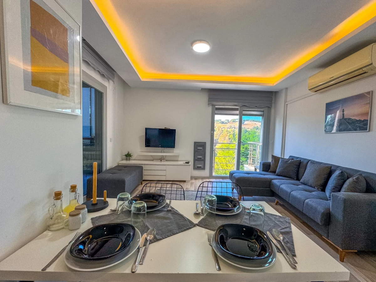 Kuşadası Lavender Residence A6 yemek alanı, salon ve açık plan yaşam alanı