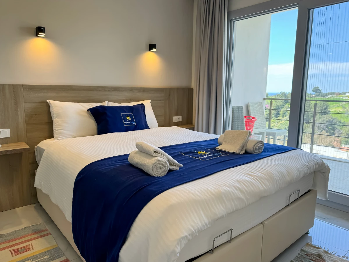 Double bedroom in a furnished apartment for sale in Kusadasi
