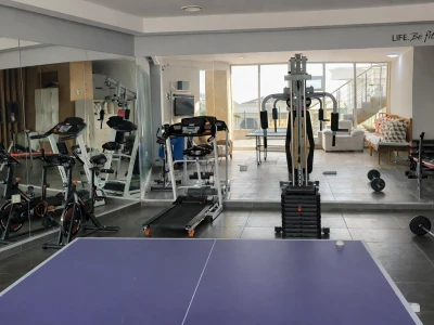 Gym and table tennis area at Lavender Residence in Kuşadası