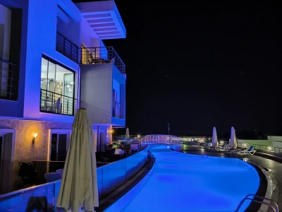 Kuşadası Lavender Residence C2 shared outdoor pool at night